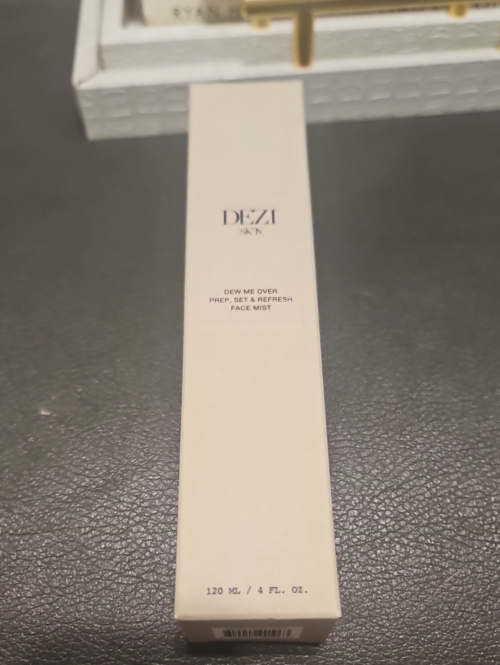 DEZI Face Mist in Cream White Packaging